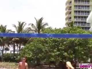 Athletic Ladies Play Two Kinds Of Balls On The Beach